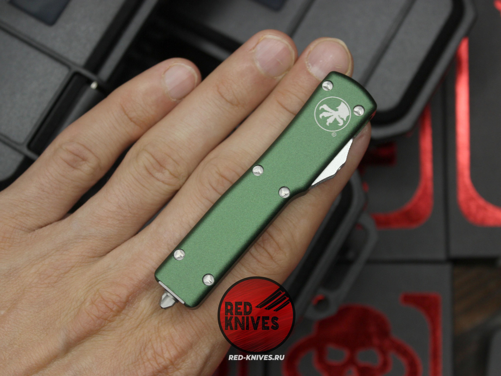 Нож Microtech UTX-70 A+++ D/E GREEN - серый клинок апокалиптик, рукоять темно зеленая