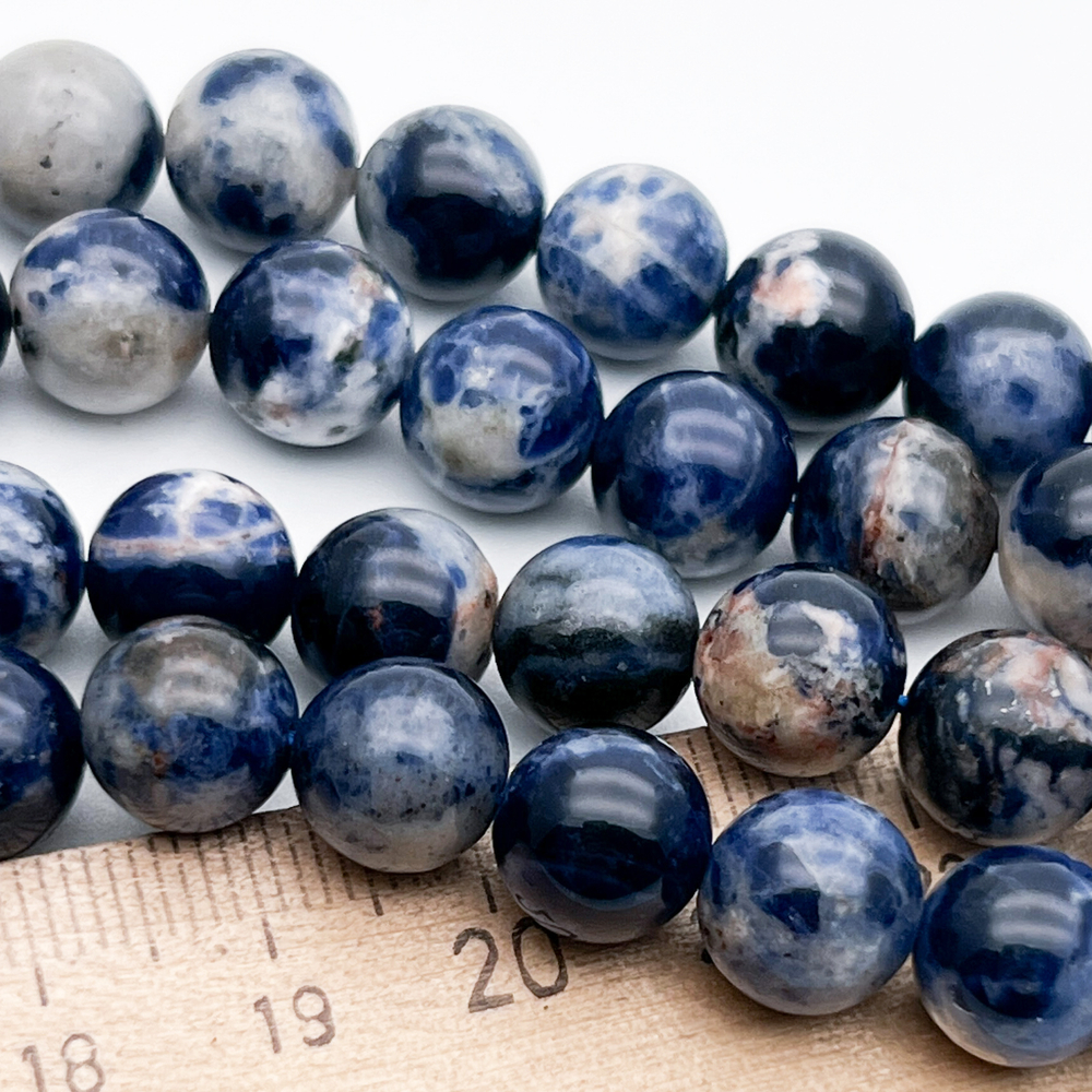 Содалит бусины, диаметр около 9,4-9,7 мм, цена за 10 шт (1/4 нити)