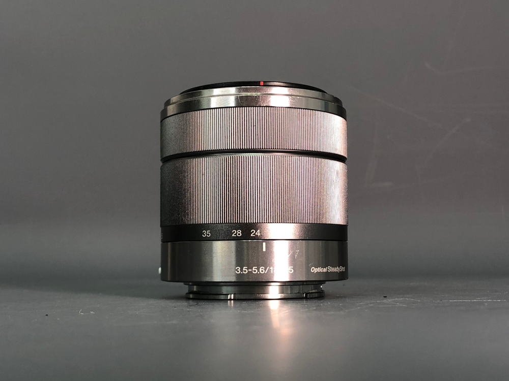 Sony Nex-5 + 18-55 (+вспышка) коцки по корпусу