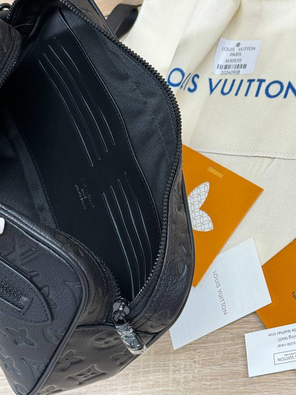 Борсетка Louis Vuitton