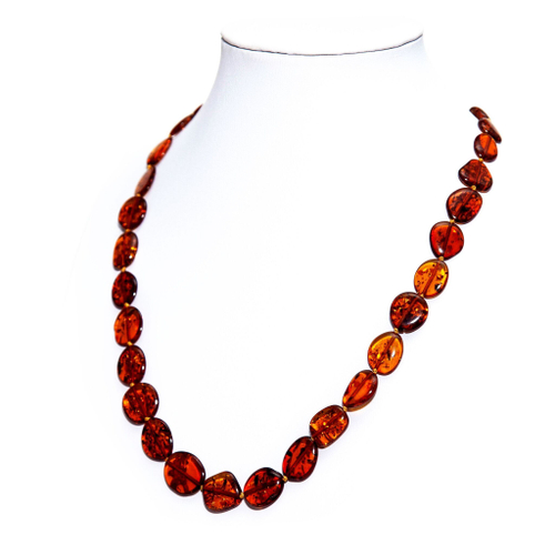 Бусы из янтаря натурального. Длина 50 см, бусины 10 на 7 мм. Янтарные бусы женские лечебные