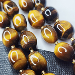 Тигровый глаз, крупная галтовка, 12-16 мм, камни овалы бочонки, штучно