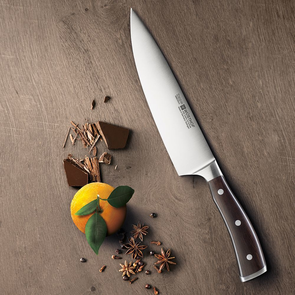 Нож поварской Шеф 20см Wuesthof Ikon Германия на столе