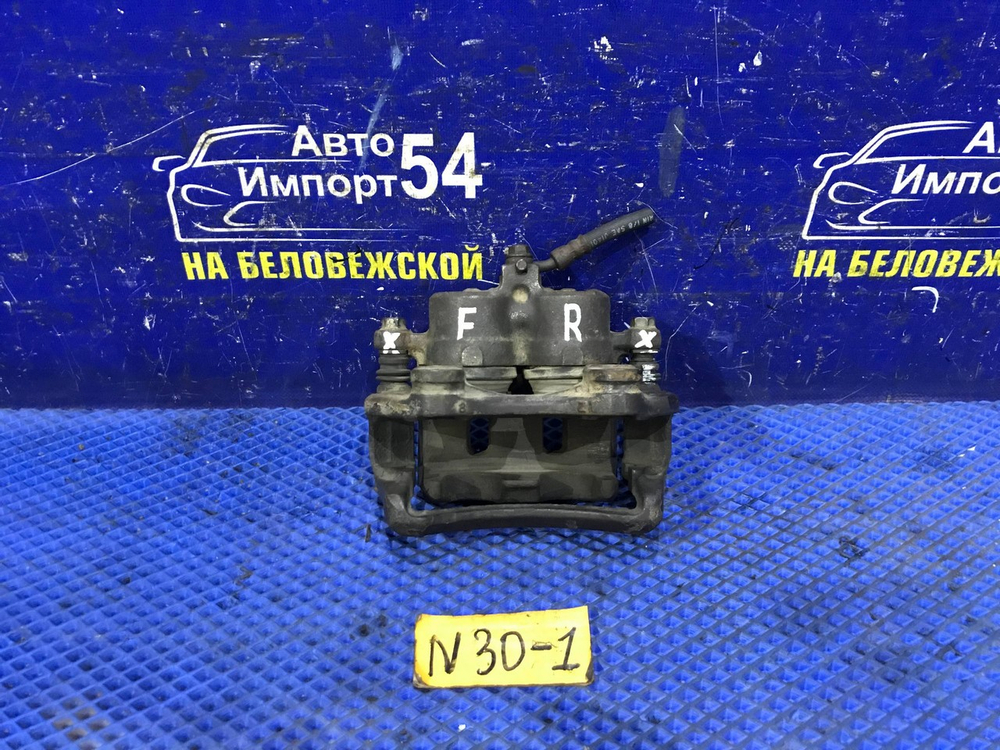 Суппорт тормозной передний правый NISSAN R’NESSA 1999