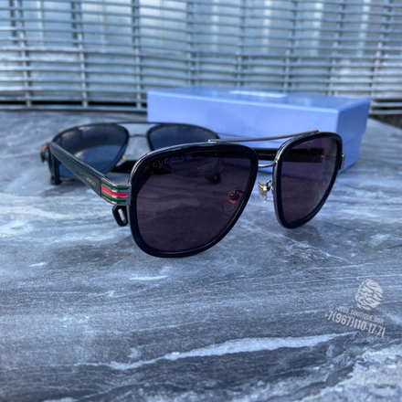 Солнцезащитные очки Gucci