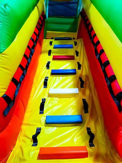 Коммерческий надувной батут "Джунгли" с горкой, 9*6*4.5 м