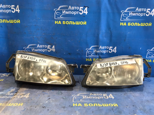 Фара передняя левая MAZDA FAMILIA 1998-2000