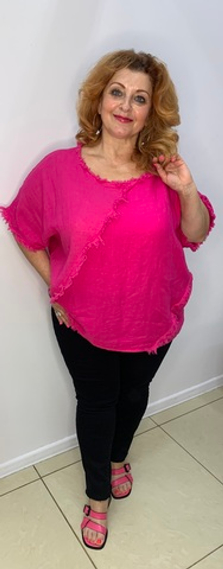 Льняная туника с вывернутыми швами и бахромой