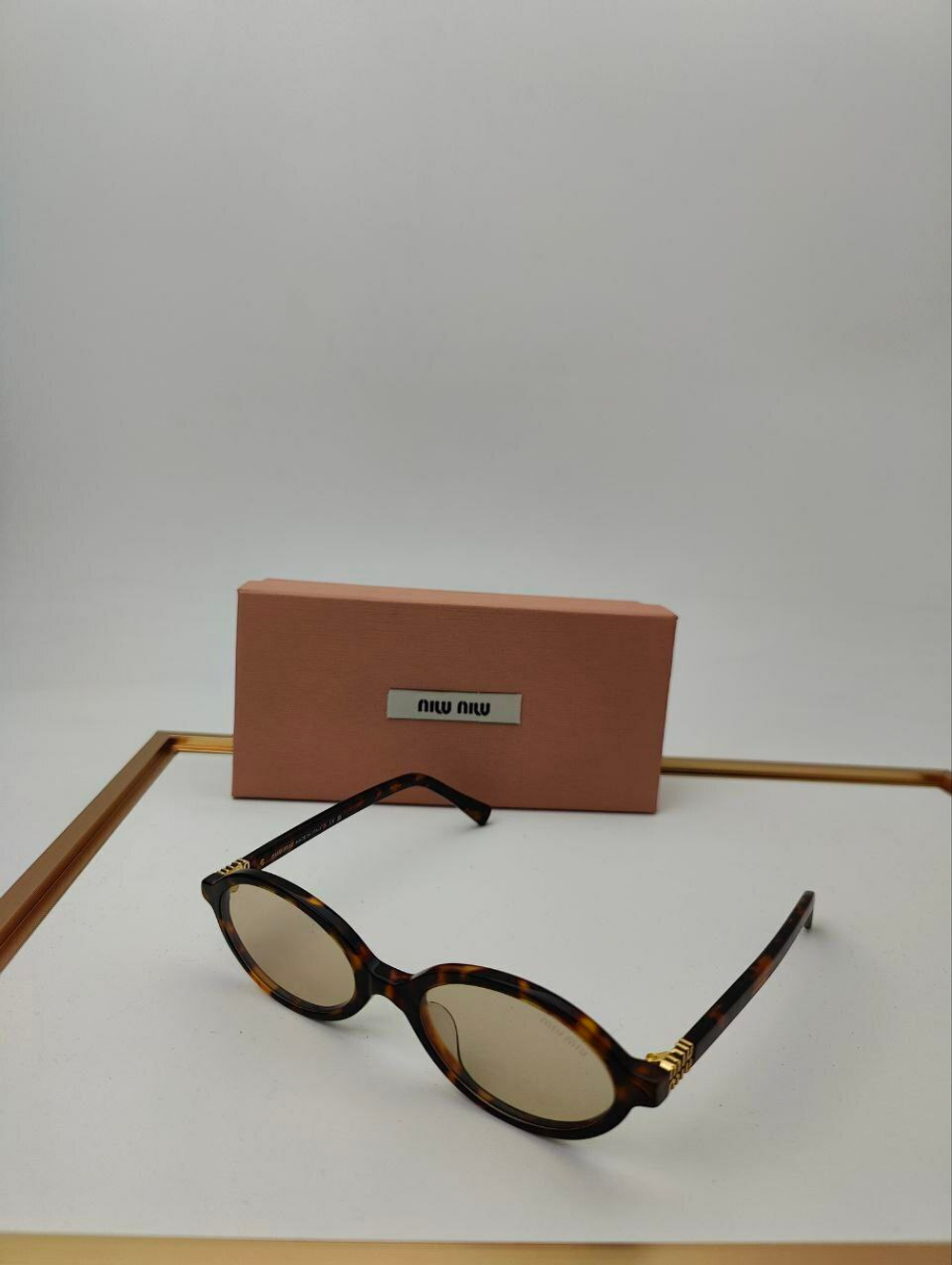 Солнцезащитные очки MIU MIU