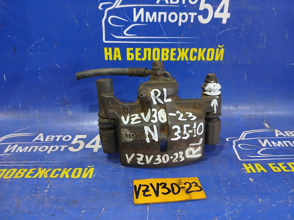 Суппорт тормозной задний левый TOYOTA CAMRY PROMINENT 1991