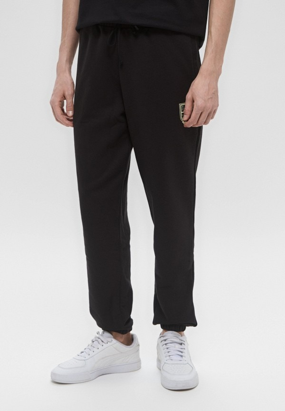 Брюки спортивные мужские PUMA SPORTS LEGACY Graphic Sweatpants TR cl