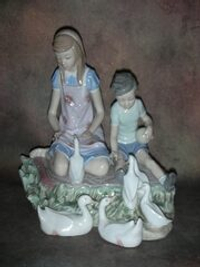 Статуэтка. Фарфор. Игра с утками в пруду. Lladro. Испания
