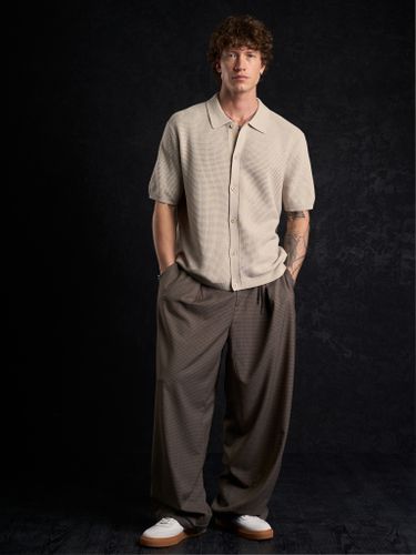 Бежевая трикотажная рубашка Laine с коротким рукавом