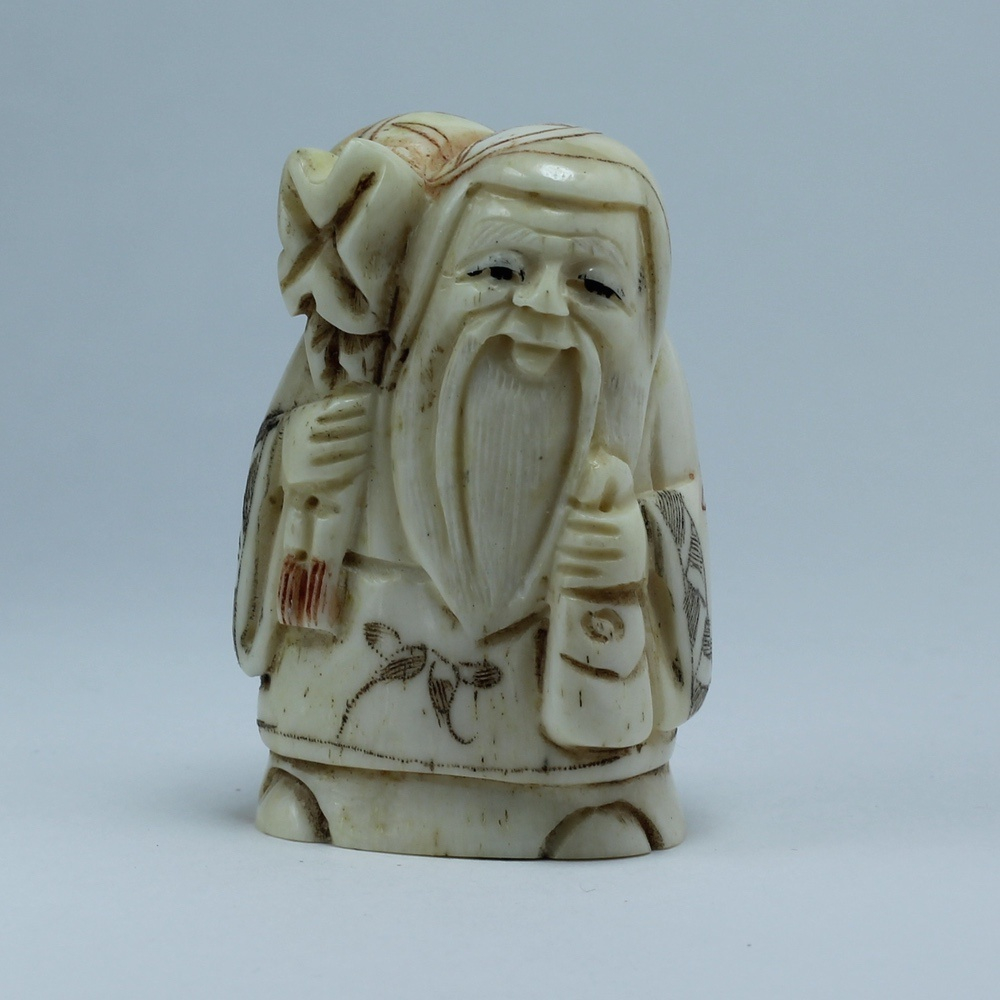 Нэцкэ Фукурокудзю с мешком и кисетом