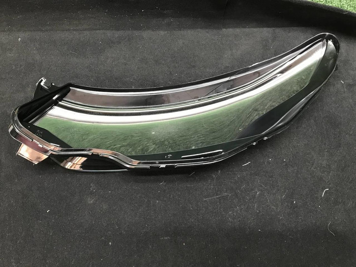 Стекло фары правое LR Discovery Sport (2019-н.в.)