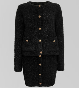 Костюмы женские