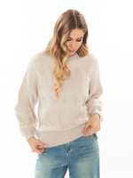 Женский джемпер бежевый с высоким воротом и объёмным узором