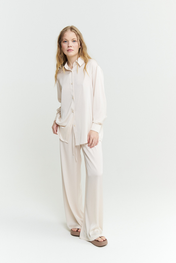 Шелковые брюки молочные