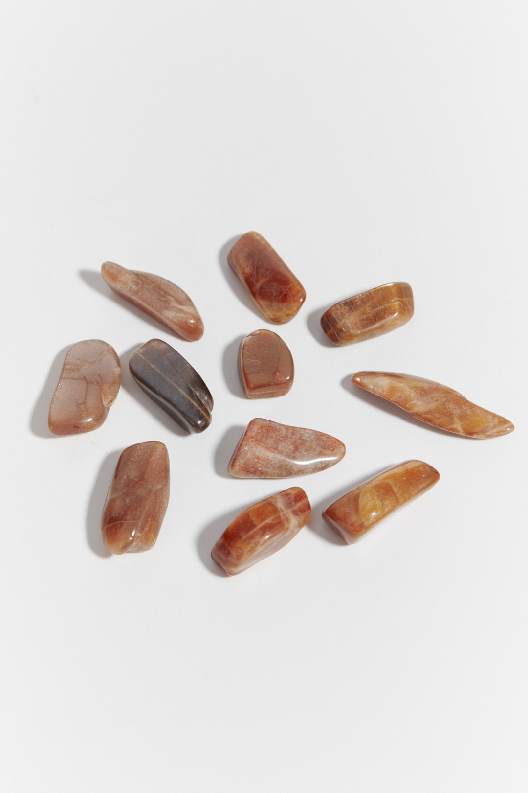 Солнечно-лунный камень галтовка