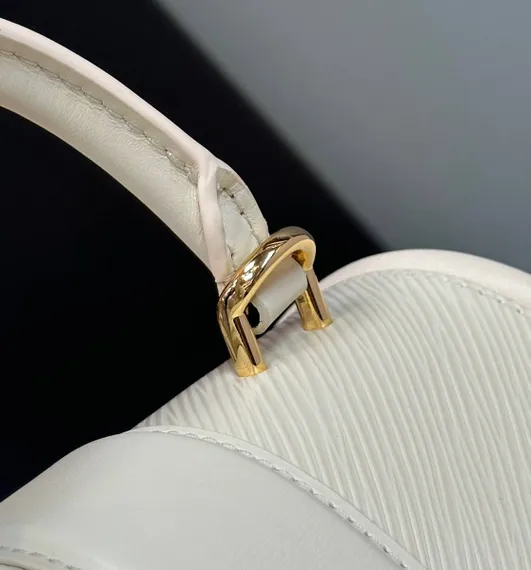 Сумка Louis Vuitton Hide And Seek кремовый