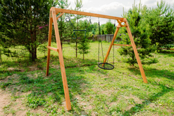 Деревянные качели с гнездом 60см и трапецией