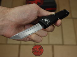 Нож Microtech Ultratech TFS/E - черная рукоять, клинок серрейторный RK-401