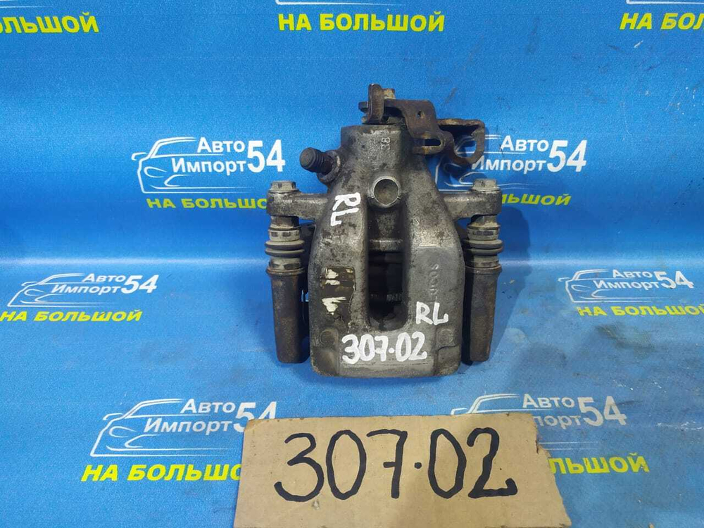 Суппорт тормозной задний левый PEUGEOT 307 2006