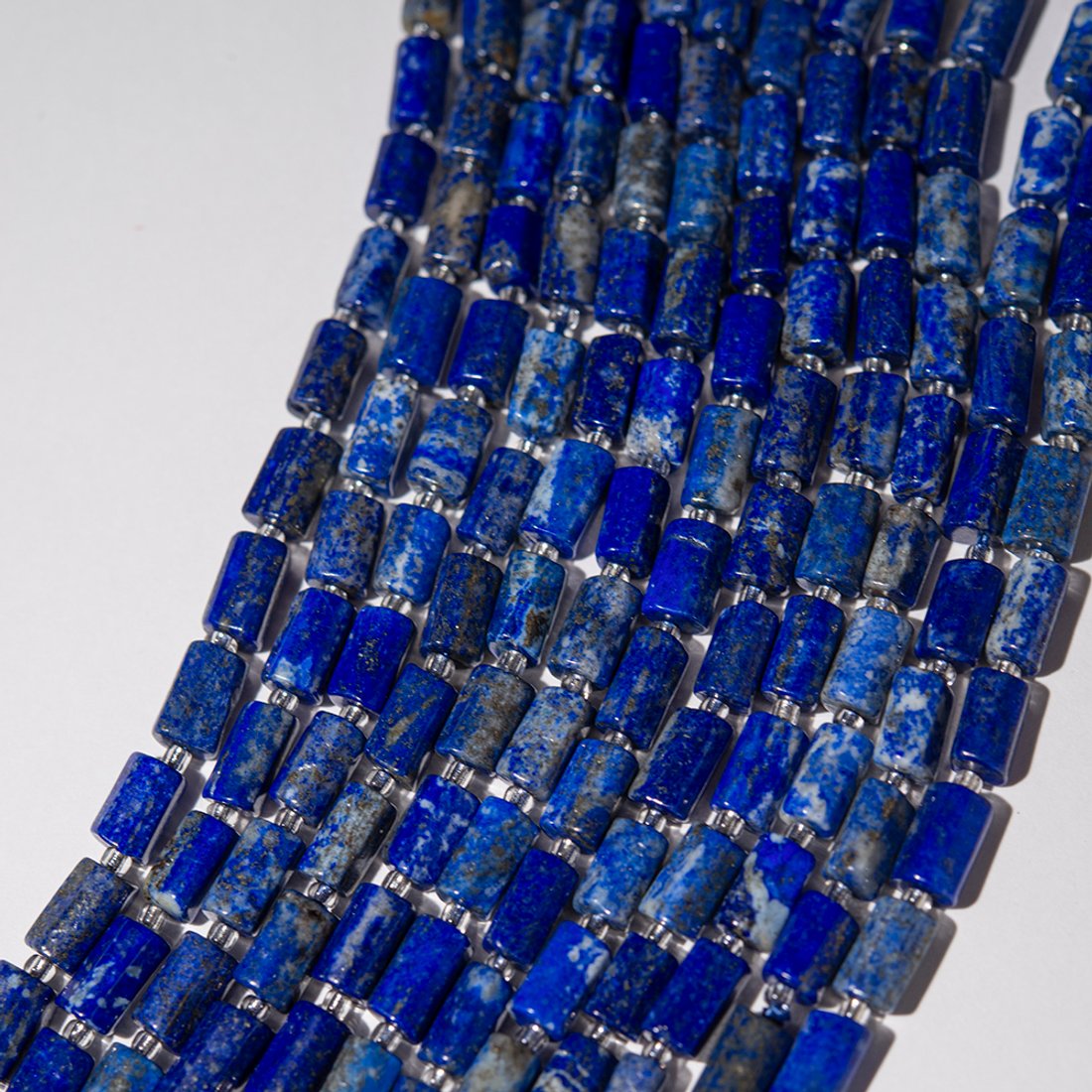 Лазурит натуральный, бочонки с гранями, 9,5-11*4,5-6,5мм