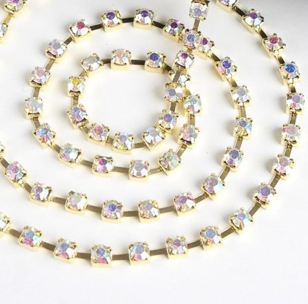 Цепь со стразами, ss16, ш. 4 мм, серебро хамелеон в золотой оправе