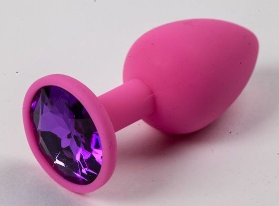 Розовая силиконовая анальная пробка с фиолетовым стразом - 7,1 см.