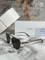 Солнечные очки Prada