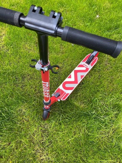 Складной двухколёсный самокат со светящимися колёсами и платформой Micar Flash 145 красный