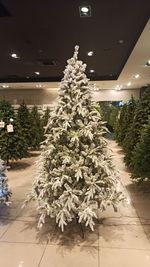 Заснеженная ель с гирляндой «Форесто» теплый свет (Литая+пвх) 210 см / 2,1 м