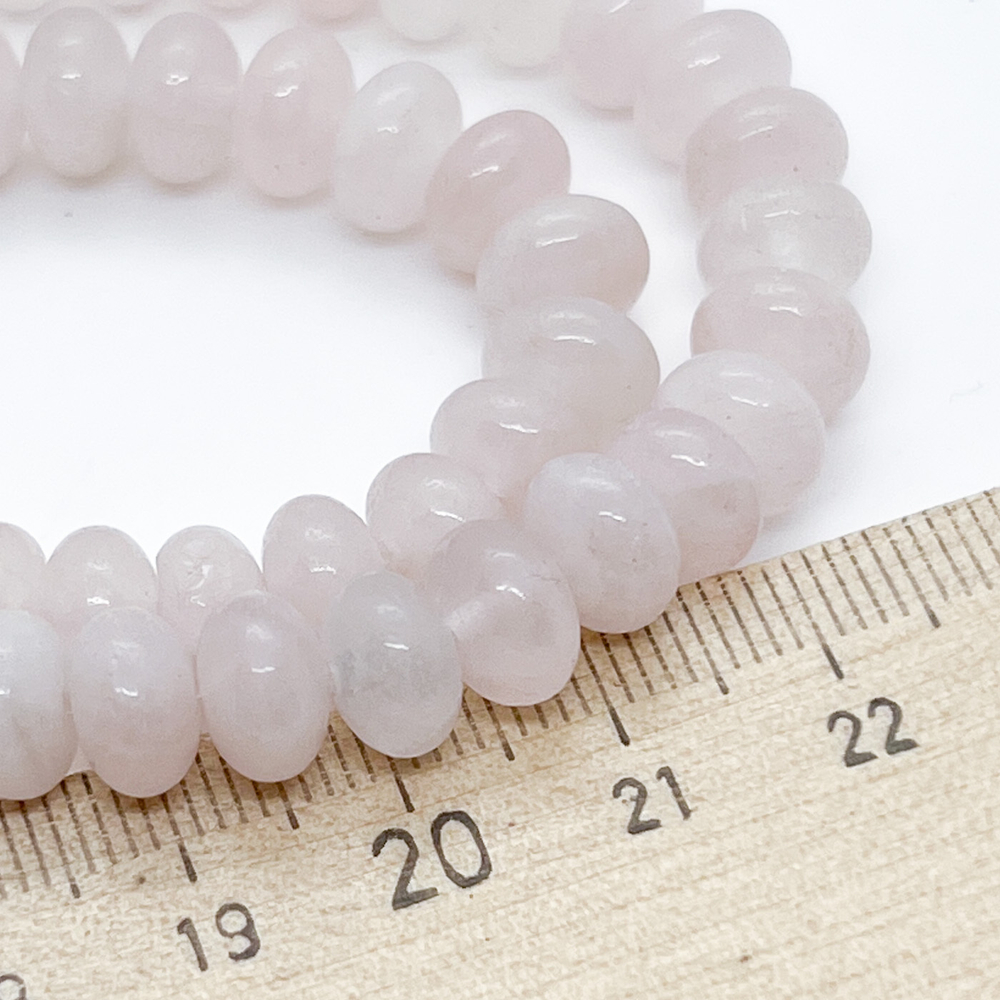 Розовый кварц (тонирован), размер около 8,2*5,5 мм, цена за 16-17 шт (1/4 нити)