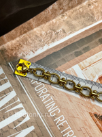 Золотистый браслет с крупными звеньями