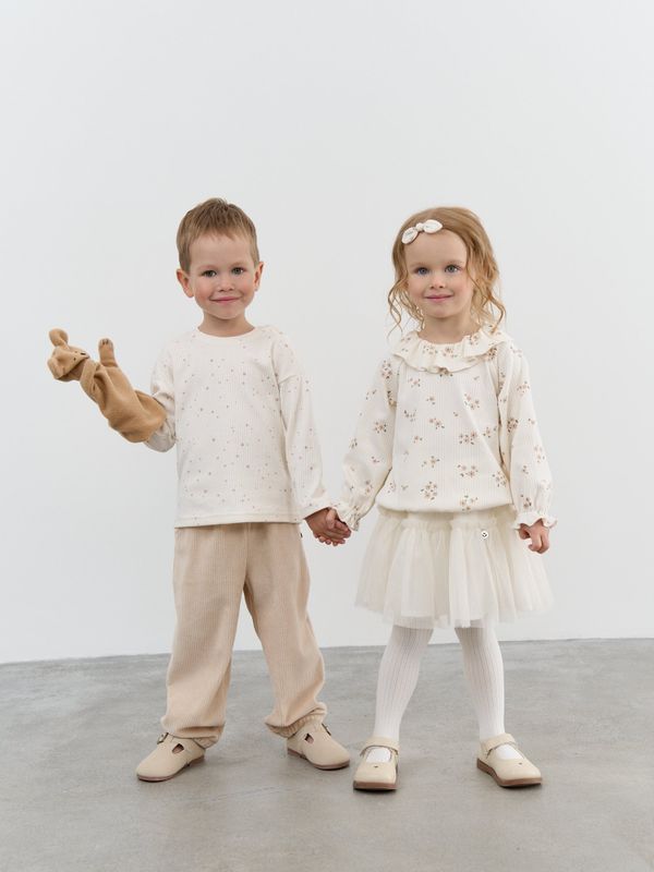 Блузка с рюшей 