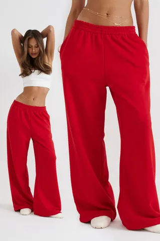 Широкие джоггеры без начеса с утяжкой красного цвета