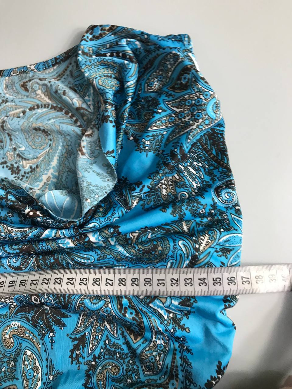 Комбинезон пестрый, визуально на 44 размер