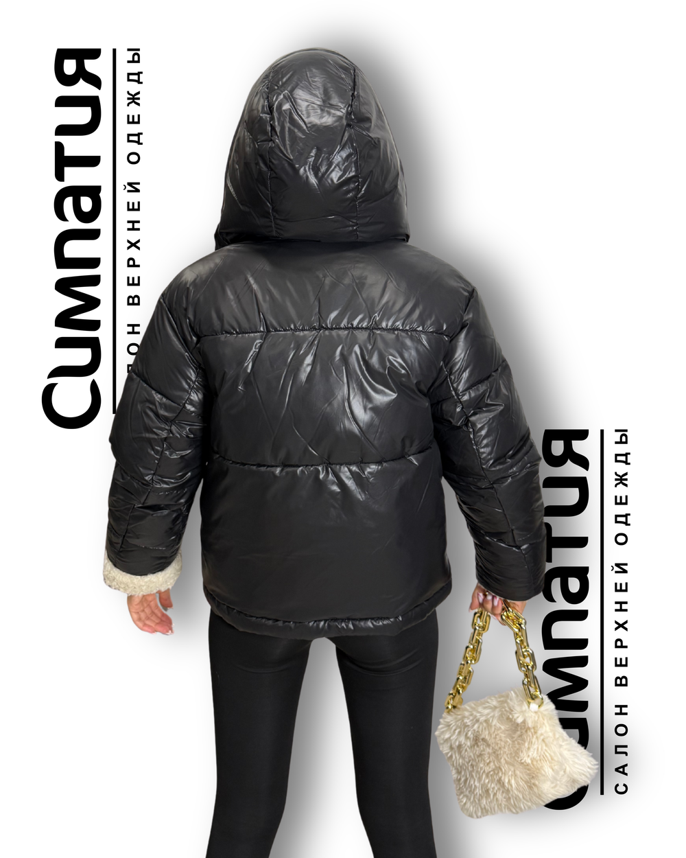 Зимняя куртка в черном цвете с декоративными деталями из эко меха