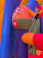 Коммерческий надувной батут «Смайлики» с крышей, размер 12*7,5*7 м