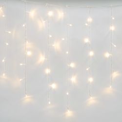 ULD-B6007-200-STK WARM WHITE IP44 Бахрома светодиодная со статическим свечением. 6м. Соединяемая. 200 светодиодов. Теплый белый свет. Провод прозрачный. ТМ Uniel