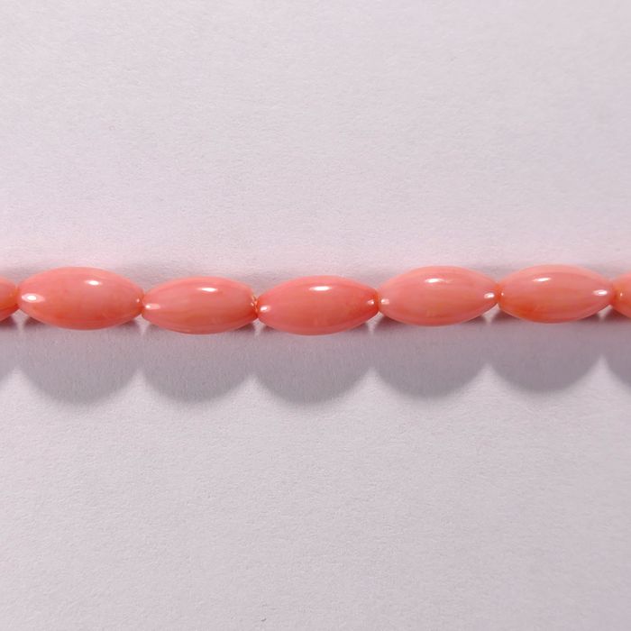 Бусина из коралла розового, облагороженного, фигурная, 4x8 мм (овал, гладкая)