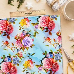 Ткань оксфорд 600 яркие розы на голубом