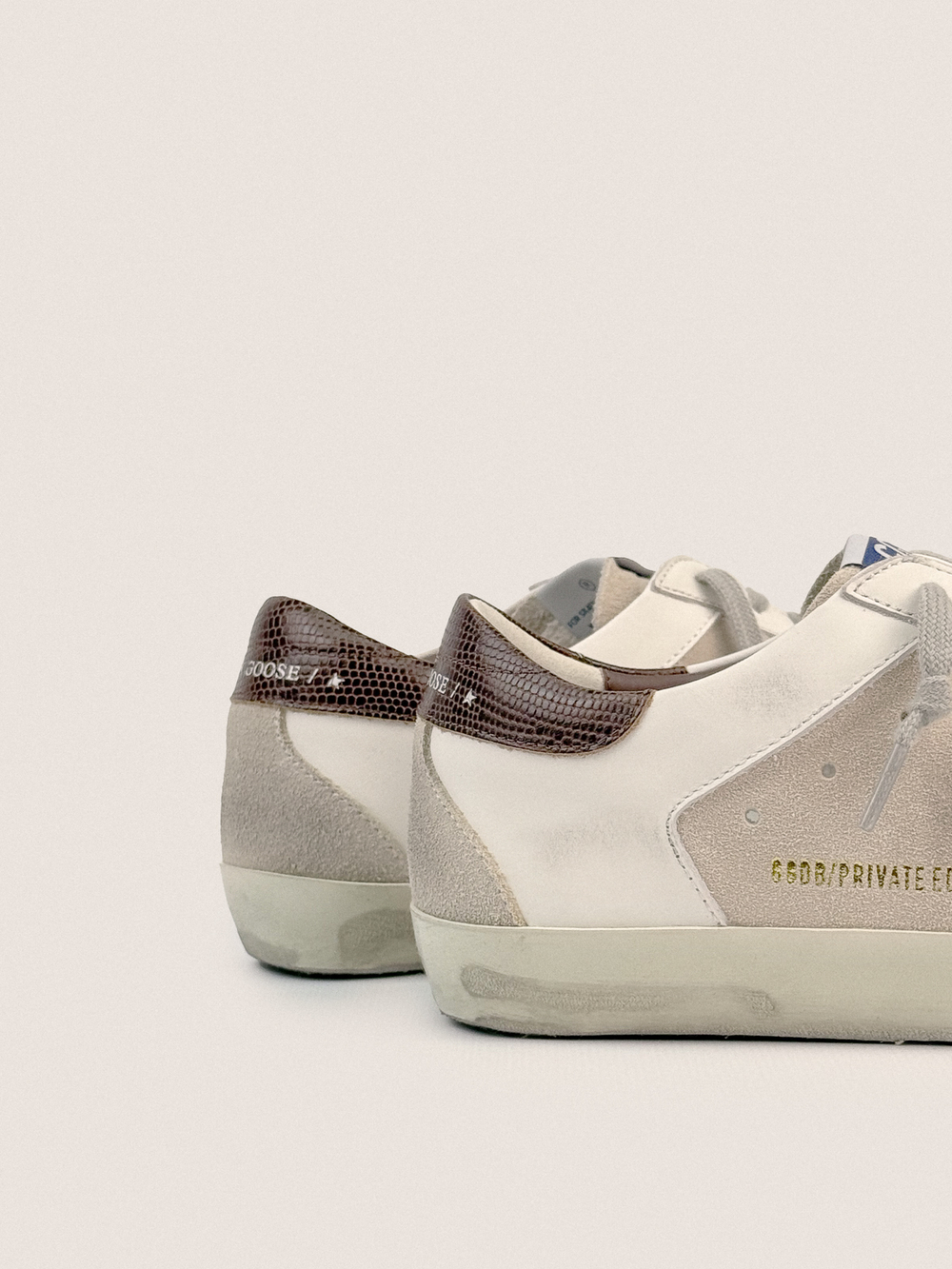 Men’s Super Star with suede inserts and lizard-print leather star