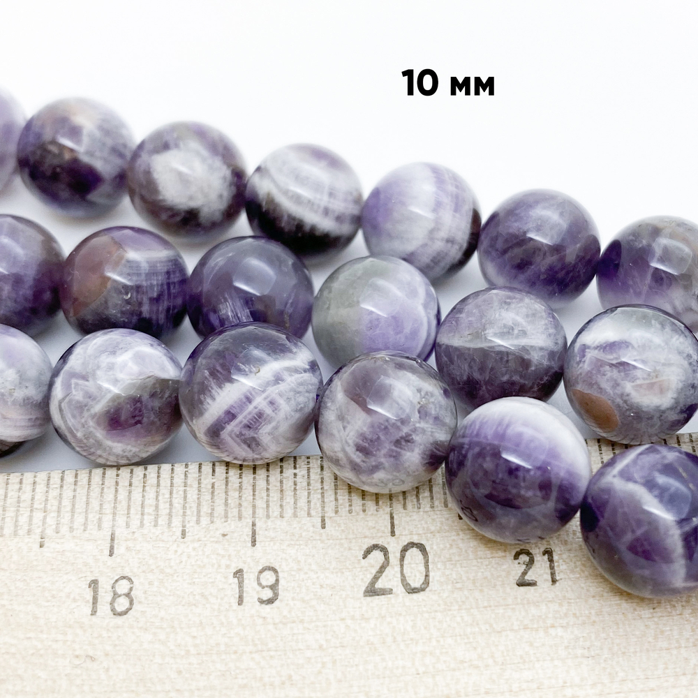 Аметист шевронный, диаметр 10,2-10,3 мм, цена за 18-19 шт (1/2 нити)
