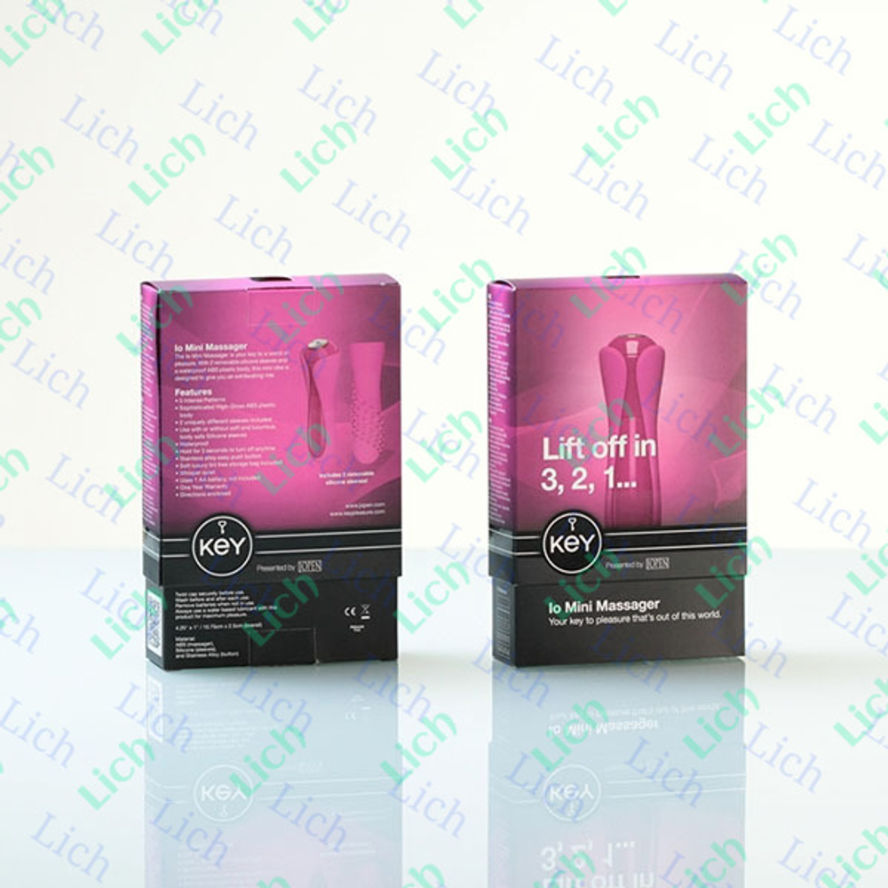 Розовый минивибромассажер с двумя сменными насадками Io Key