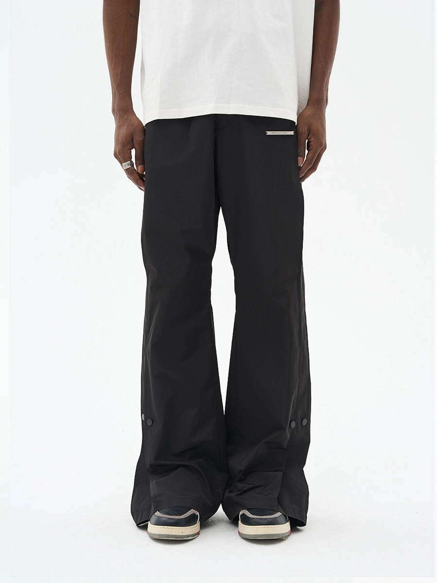 Брюки HARSHandCRUEL Wide fit Nylon Buttoned Pants