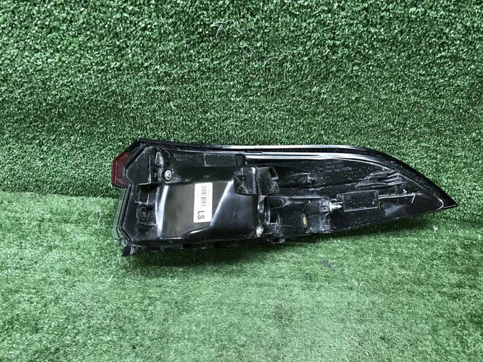 Фонарь левый внешний Toyota Corolla Е210 (18-нв)