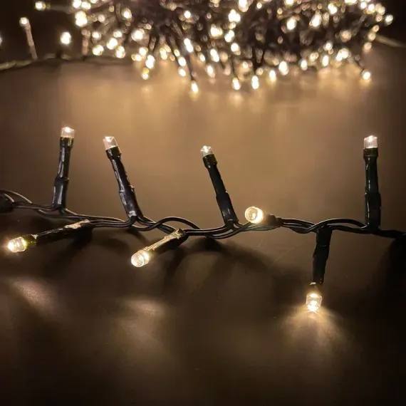 Светодиодная нить Snake Light 2000 теплых белых ламп, 40 м., 24В, 8 режимов, зеленый провод, для елки 260-300 см., Christmas DeLuxe (85744)