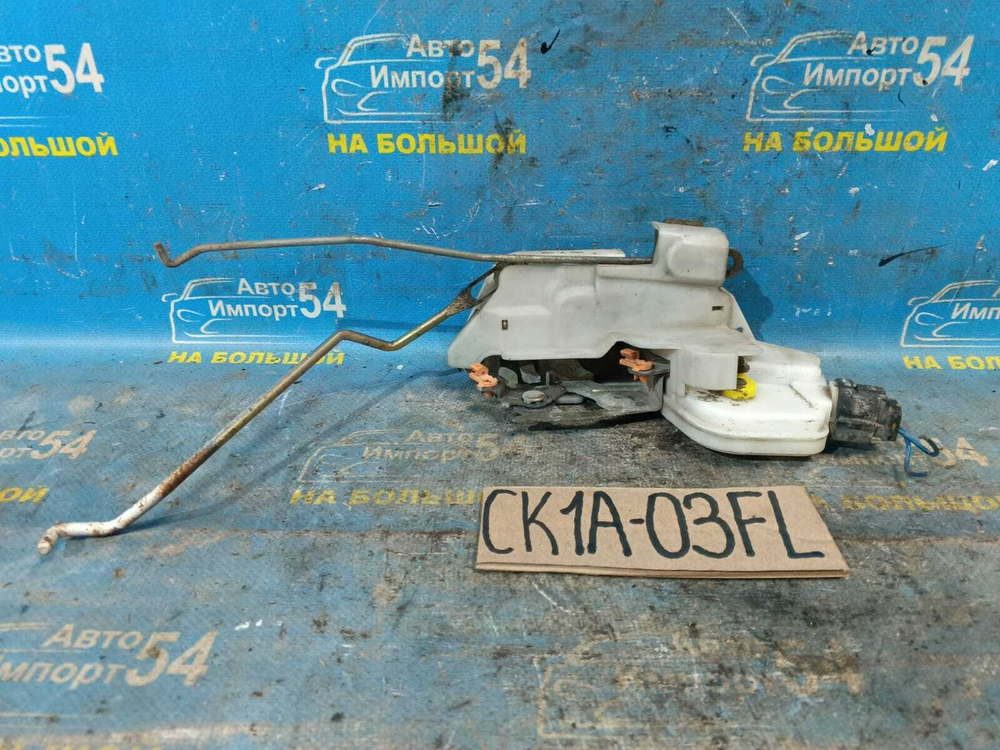Замок двери передней левой MITSUBISHI LANCER 1998